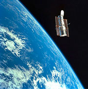 Discovery slowly backs away from Hubble Discovery slowly backs away from Hubble after the release.